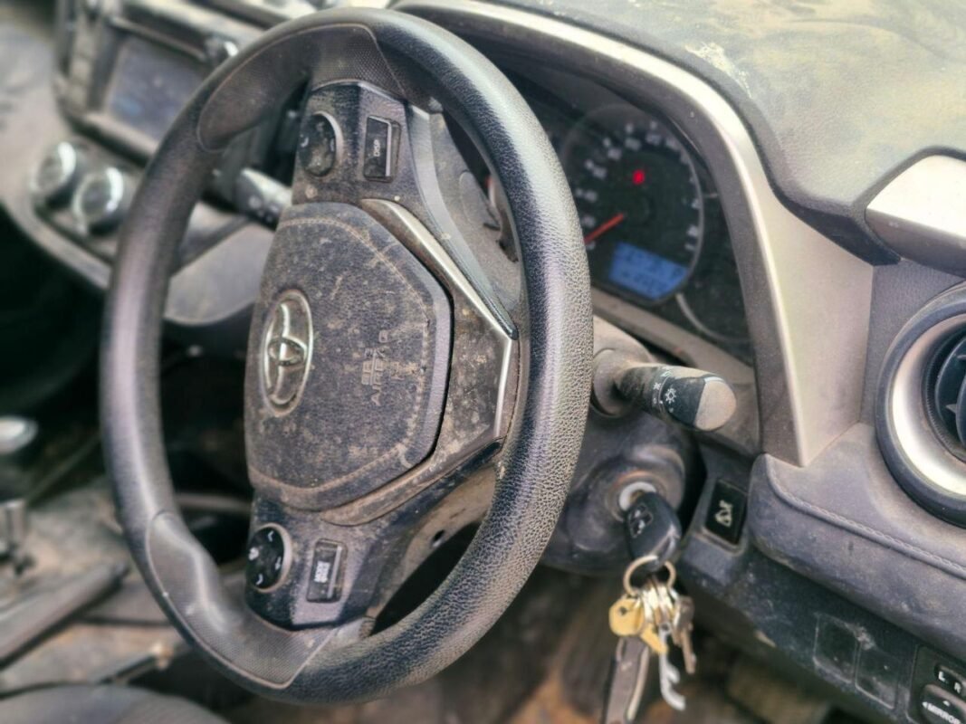 Before interior detail on a Toyota RAV4 (steering wheel and dash), Gordon