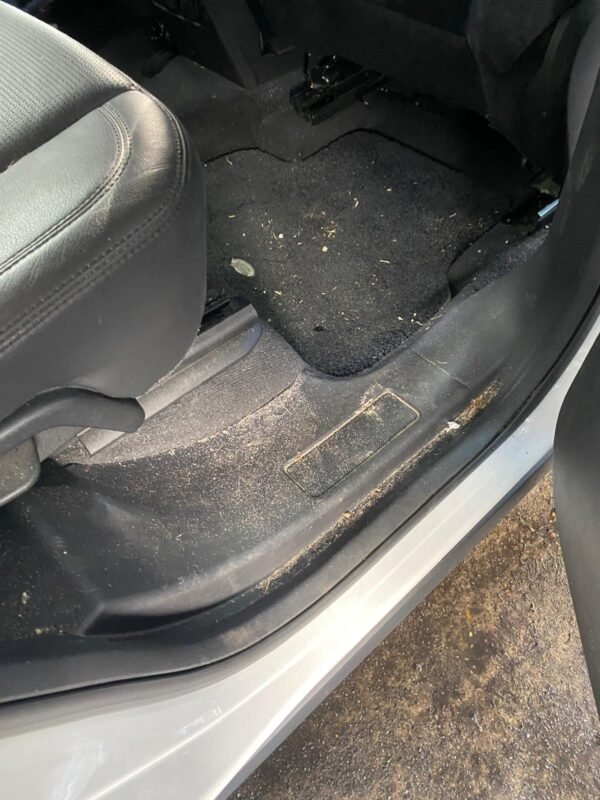 Before interior detail on a Land Rover Discovery Sport (front footwell), Gordon