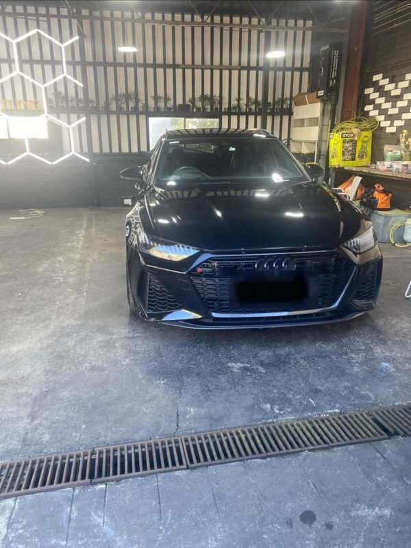 Black Audi RS6 inside the VIP Car Detailing workshop in Gordon