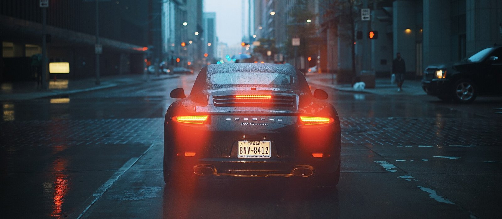 Water beading on a ceramic coated Porsche in the rain
