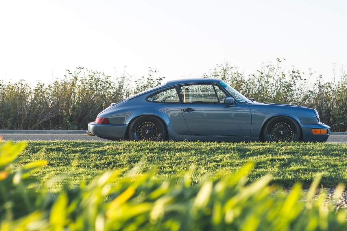 Blue Porsche 911 in the late afternoon sun